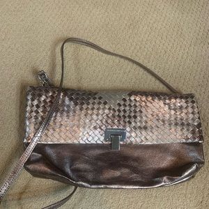 Bronze leather bag with long shoulder strap or can be used as clutch bag.